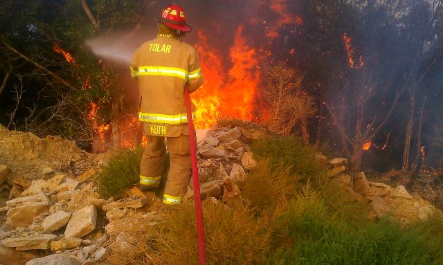 Lt. Keith knocking down a hot spot.